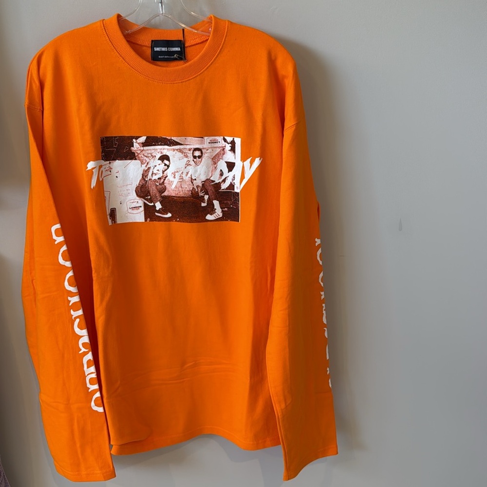 SheThisComma orange graphic long sleeve shirt Size L, new with tags